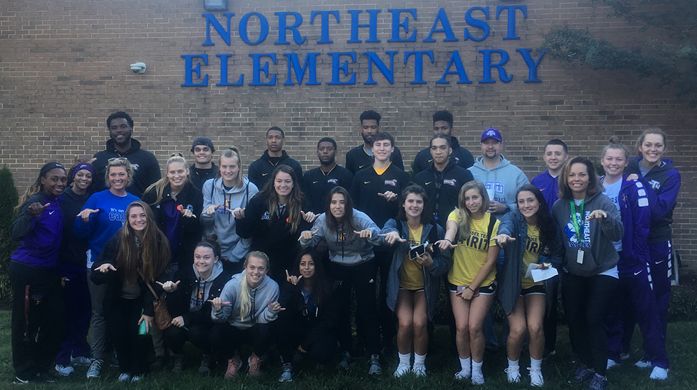 Multiple Golden Eagle teams volunteer at Northeast Elementary School
