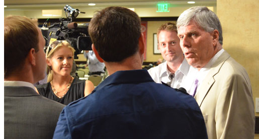 Golden Eagle coach Watson Brown meets with television reporters at OVC Media Day