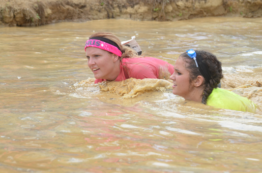Golden Eagle softball team gets down and dirty in mud run